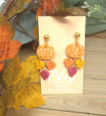 Polymer clay pumpkin earrings with fall leaf dangles