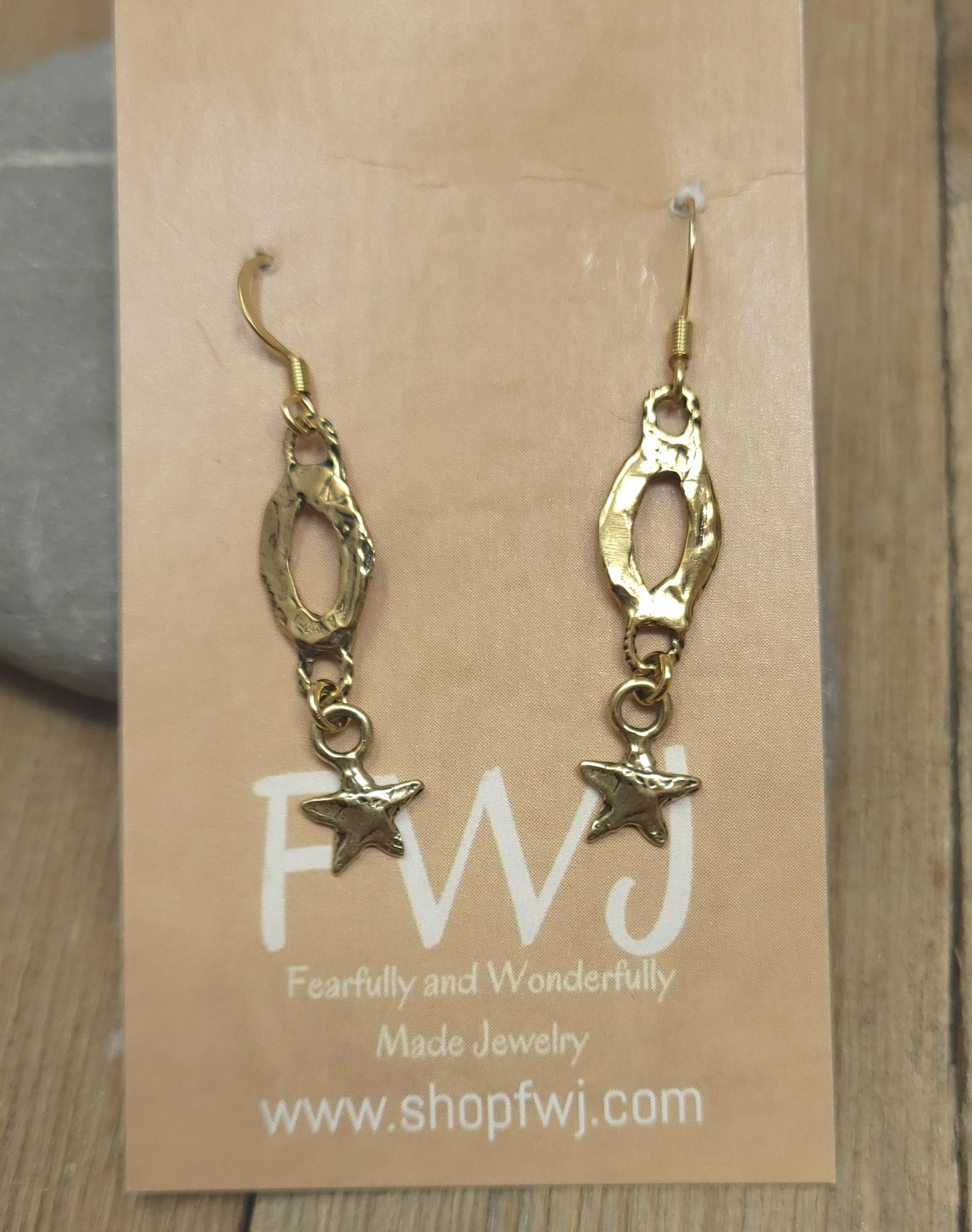Rustic hammered gold star earrings