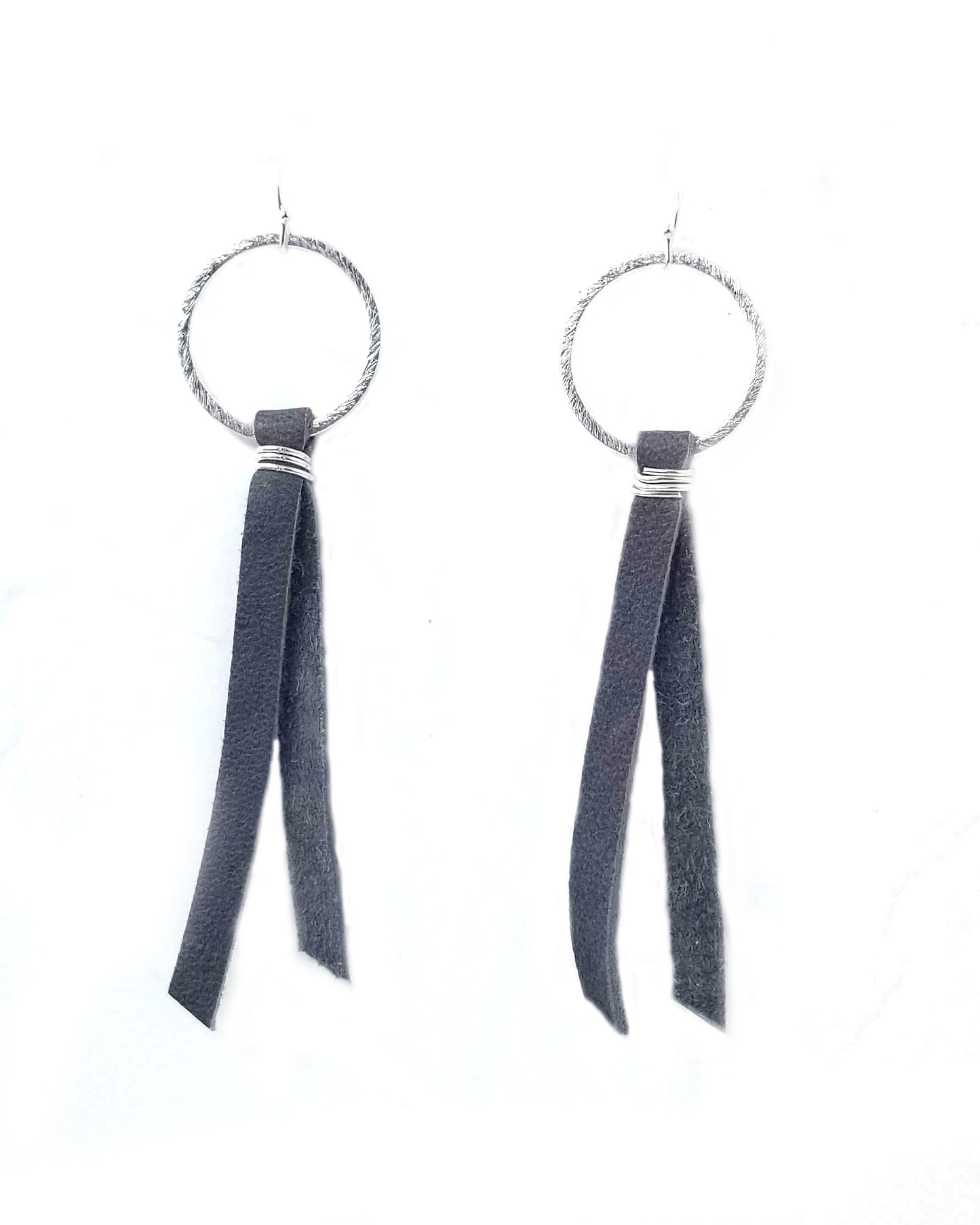 Brushed gold or silver hoop earrings with leather tassel