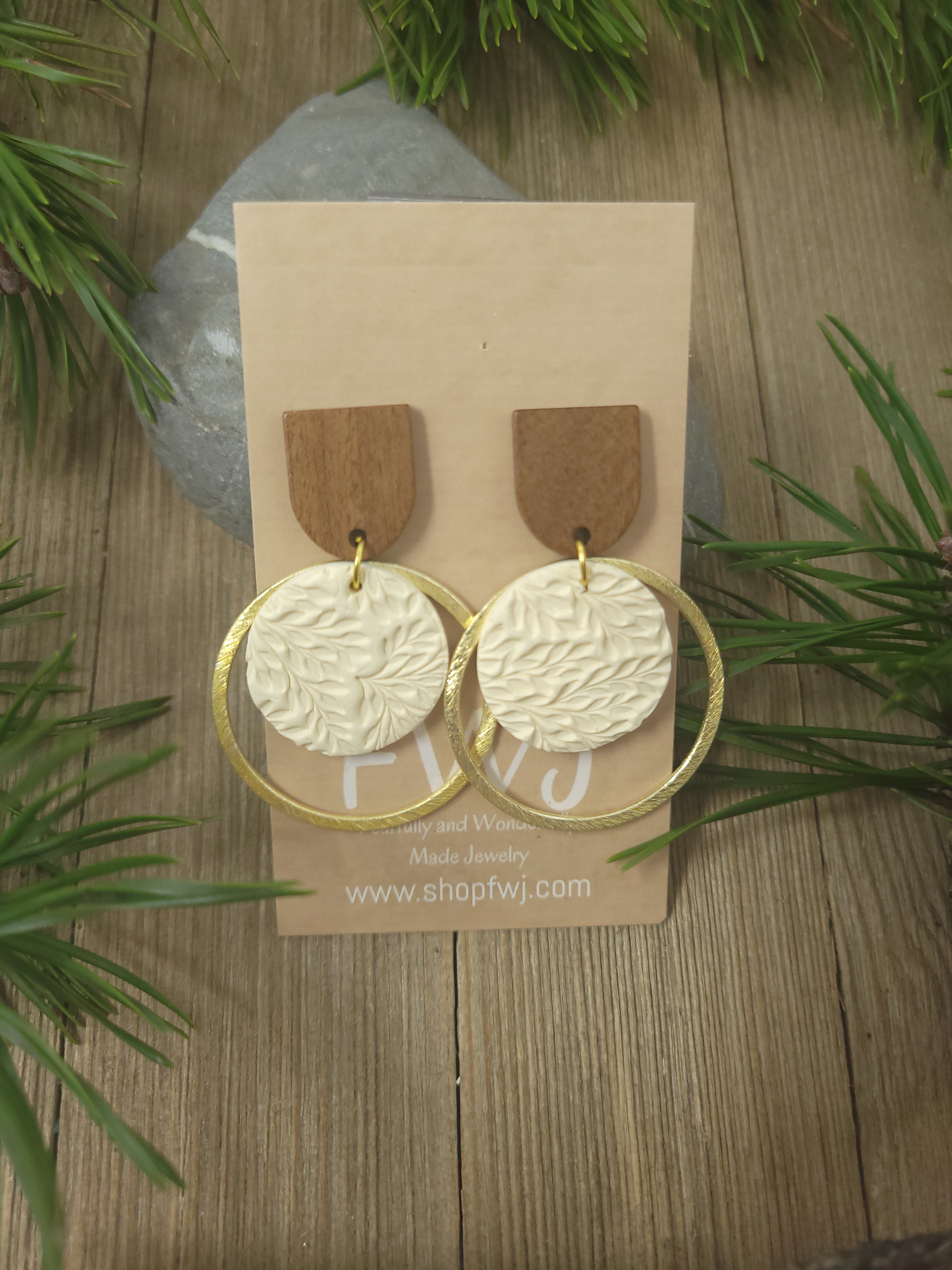Cream colored clay and wood earrings