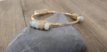 Robin's egg blue agate bangle, amazonite cluster bangle, and serpentine bangle set