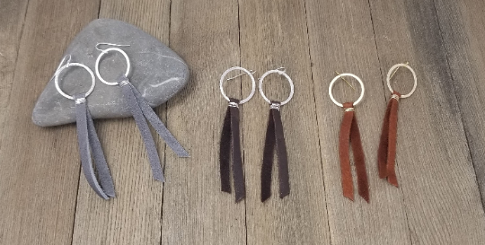 Brushed gold or silver hoop earrings with leather tassel