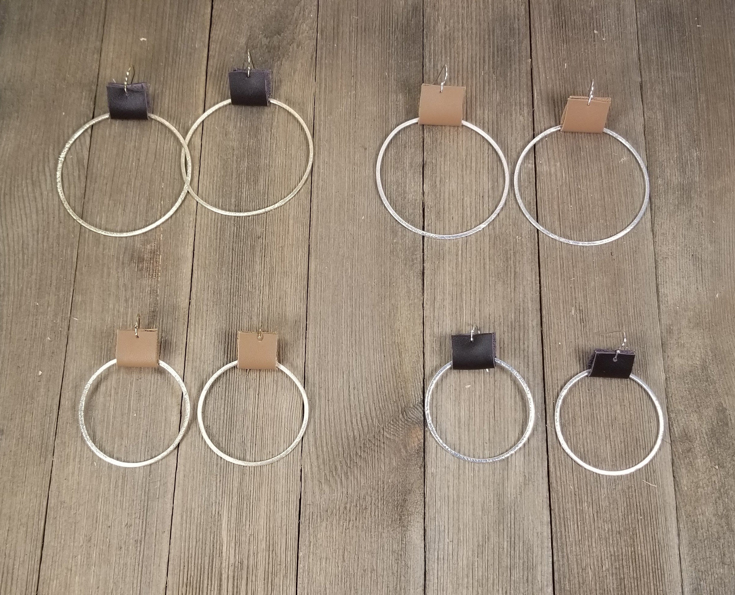 Brushed gold or silver hoop earrings with leather accents--3 sizes